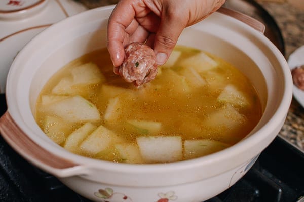 Lowering meatballs into soup, aedison.aieoederdu.tk
