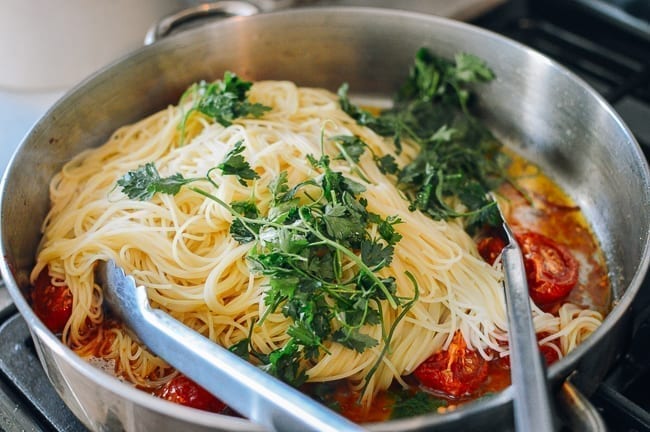 Tossing together slow roasted tomato pasta, aedison.aieoederdu.tk