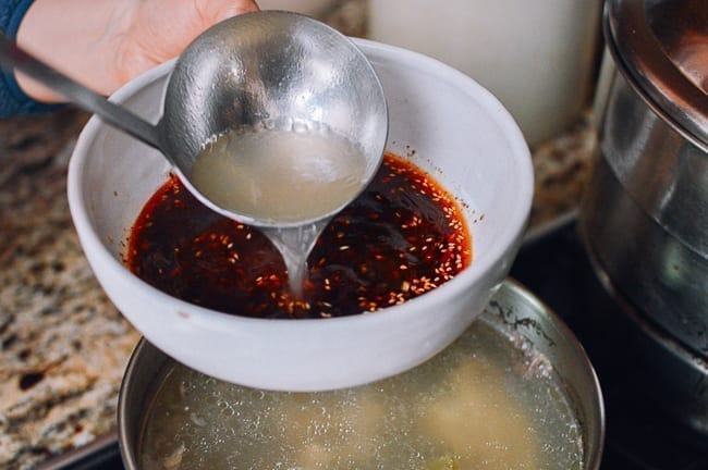 Adding hot stock to bowl of aromatics and seasonings, aedison.aieoederdu.tk
