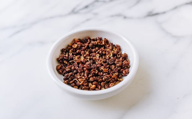 Red Sichuan Peppercorns in white dish, aedison.aieoederdu.tk